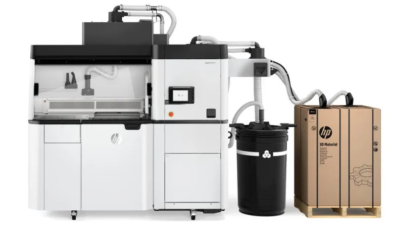 HP Jet Fusion 5200 industrial 3D printer with its processing station